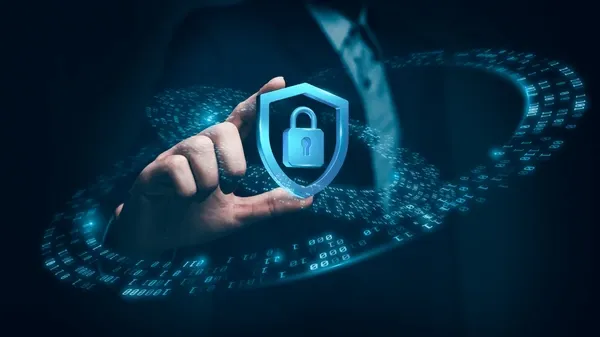 businessman-holds-glowing-security-shield-600nw-2514694015.webp