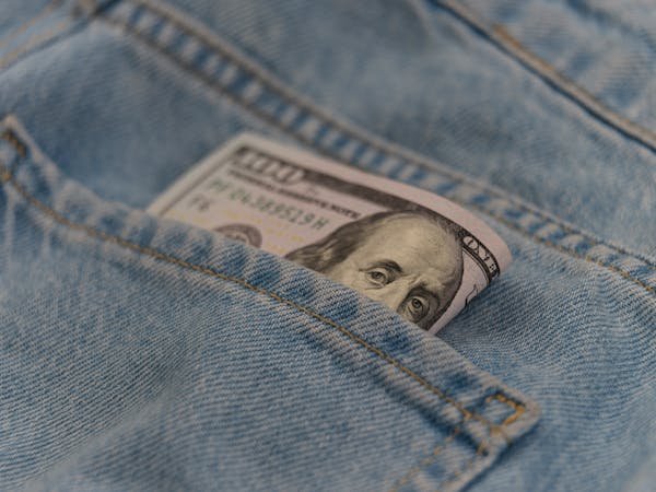 free-photo-of-one-hundred-dollar-banknote-money-in-back-pocket-jeans-pants.jpeg