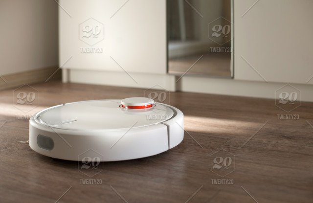 stock-photo-technology-vacuum-cleaner-wireless-technology-robot-cleaning-at-home-robots-robotics-using-technology-db437428-0537-4ee0-88c8-d55a303b68f7.jpg