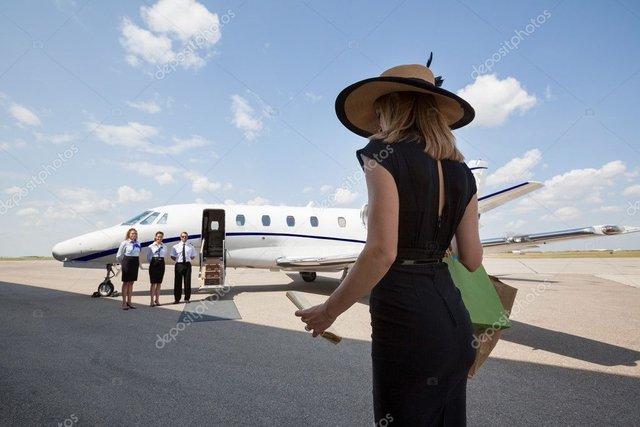 depositphotos_40842503-stock-photo-woman-walking-towards-pilot-and.jpg