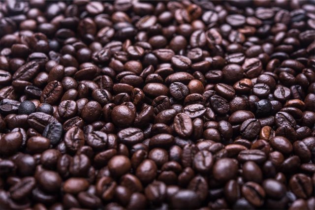 close-up-of-roasted-coffee-beans-in-rich-detail.jpg