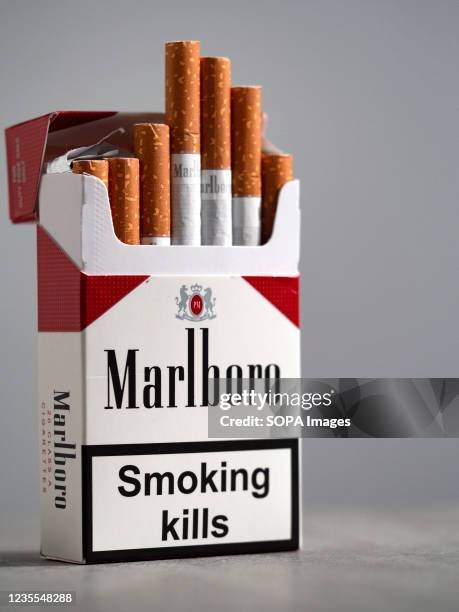 in-this-photo-illustration-a-pack-of-marlboro-cigarettes-made-by-philip-morris-with-a.jpg