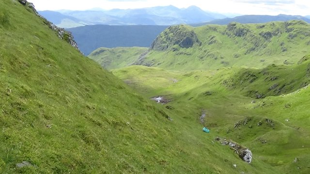 51 Backpack rolling down slope.jpg