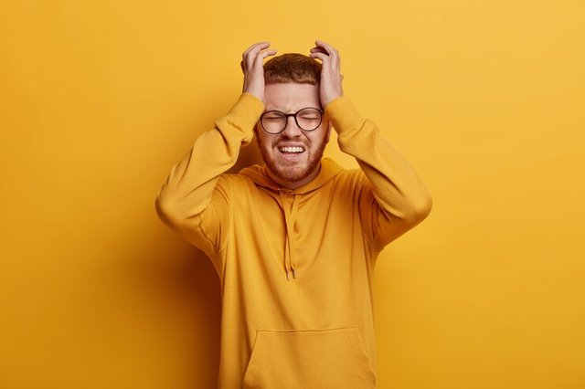 close-up-bearded-young-man-wearing-glasses-isolated_273609-35492.jpg