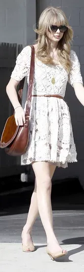 Taylor-Swift-Crochet-Dress-Brown-Saddle-Bag.webp