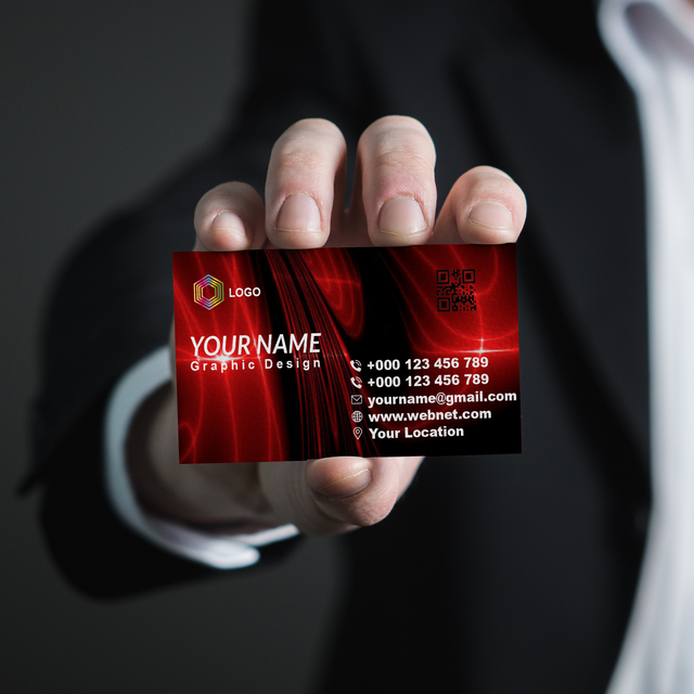 #3 Man Holding Business Card.png