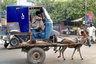 rikshaw khota and cell phone.jpg