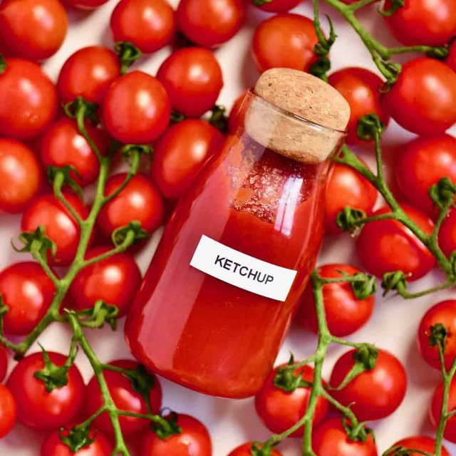 Homemade-ketchup-in-a-bottle-and-tomatoes.jpeg