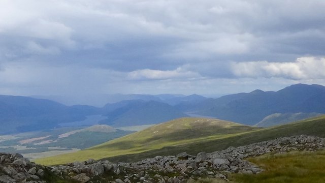 42 Gathering clouds and view north north east to Binnein Shuas with Loch Laggan at the left and Lochan na h-Earba to the right.jpg