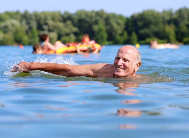 mature-man-swimming-lake.jpg