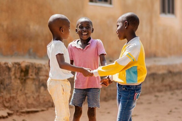 medium-shot-smiley-african-boys-playing-together_23-2148860431.jpg