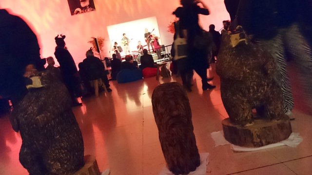 Bears and a tree spirit guarding the Monster Ceilidh Band in the Great Court