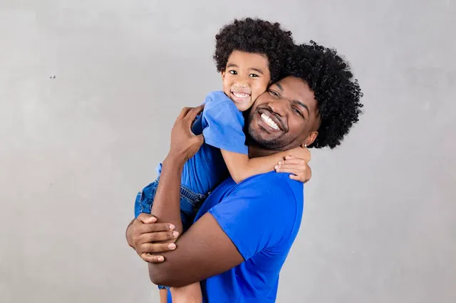 afro-dad-black-son-gray-background-smiling-happy-afro-daddy-fathers-day-father-s-day-august_432566-11968.webp