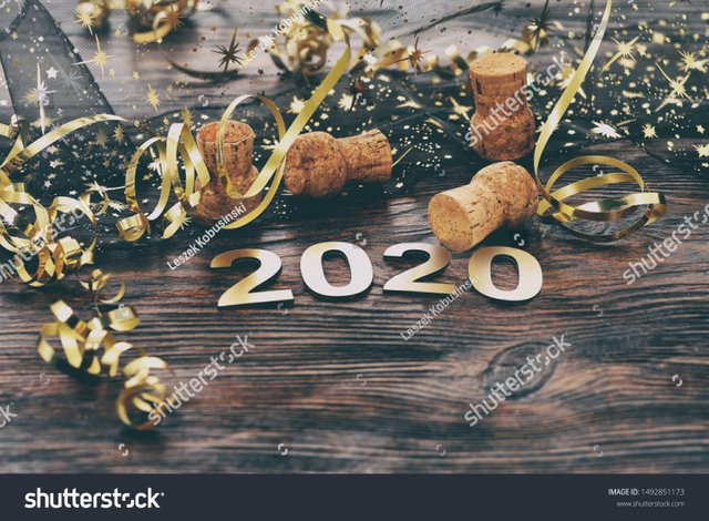 stock-photo-happy-new-year-symbol-from-number-on-wooden-background-1492851173.jpg