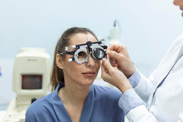 ophthalmologist-examining-woman-with-optometrist-trial-frame-female-patient-check-vision-ophthalmological-clinic_657921-169.jpg