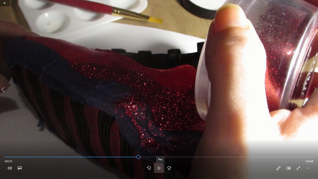 Sprinkling glitter on shoes.png