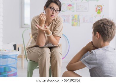 teacher-reprimanding-misbehaved-child-sitting-260nw-564592786.jpg