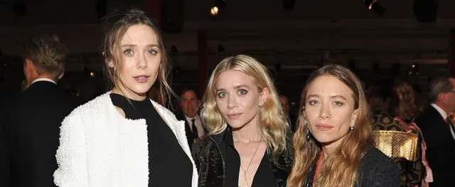 Elizabeth-Olsen-White-Coat-LACMA-Art-Film-Gala-2016.webp