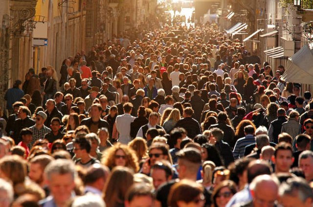 large-group-of-people-crowding-rome-s-downtown-streets-in-a-sunny-day-on-a-warm-day-the-historic-downtown-of-rome-italy-is-flooded-by-people-and-tourists-enjoying-monuments-and-famous-places-horizontal-compos.jpg