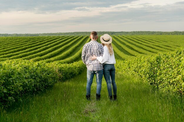 young-couple-farm-admiring-view_23-2148579739.jpg