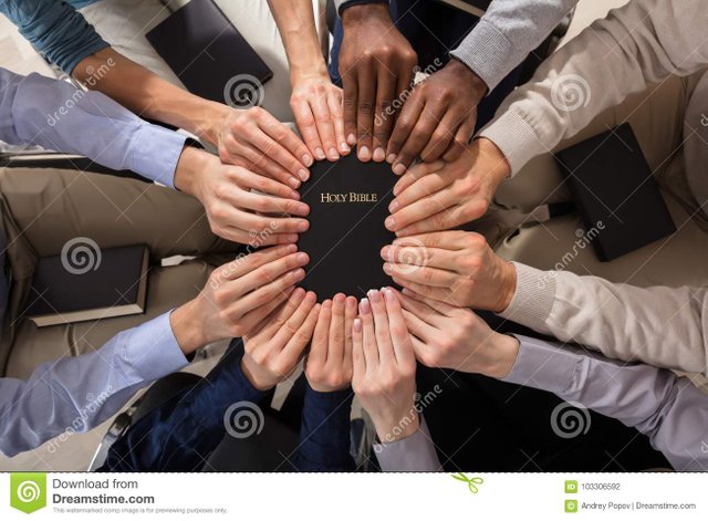 C__Data_Users_DefApps_AppData_INTERNETEXPLORER_Temp_Saved Images_overhead-view-hands-holding-holy-bible-103306592.jpg