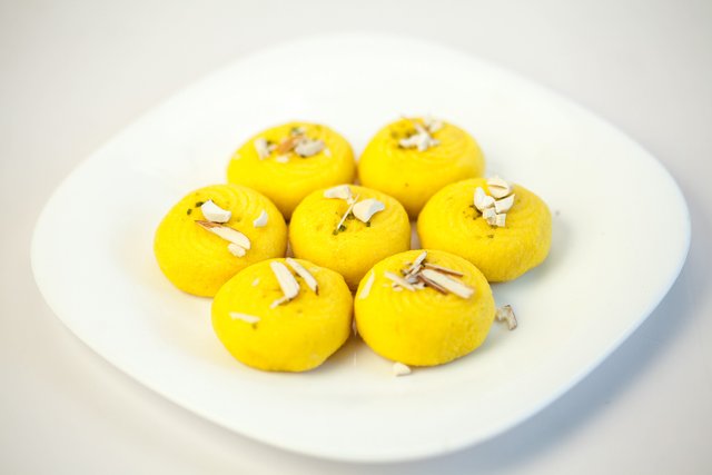 Indian_Sweet_Dessert_Peda_in_a_white_bone_china_plate.jpg