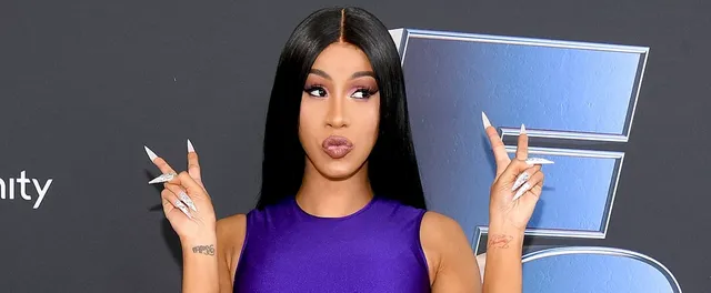 cardi-b-diaper-tutorial-long-nails-video.webp