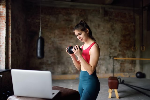 young-woman-workout-by-laptop-online-fitness-coach-workout-club-trainer-video-sport-class-social_t20_1nX4Yv.jpg