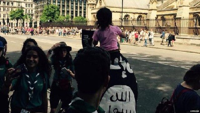 man with isis flag in london.jpg