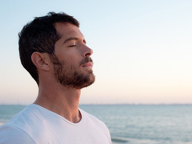 heart-breathing-man-on-beach.jpg