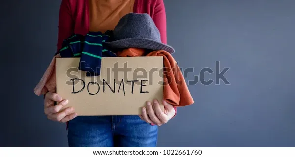 donation-concept-woman-holding-donate-600w-1022661760.webp