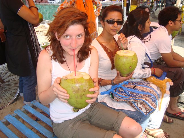 Drinking_green_coconut_at_Cox's_Bazar_(3993491295).jpg