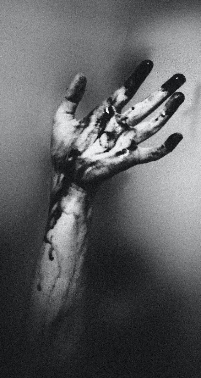 photo-of-hand-with-dark-paint-3339126.jpg