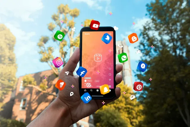 hand-holding-smartphone-social-media-concept_23-2150208253.webp
