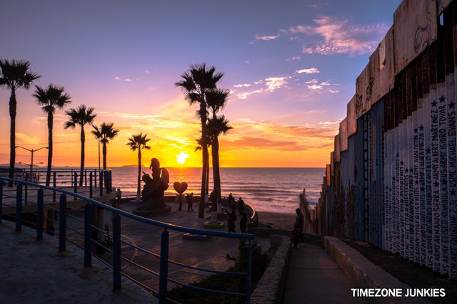 Sunset by the wall Tijuana 2.jpg