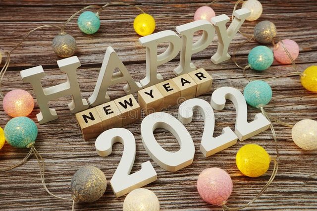 happy-new-year-alphabet-letter-led-cotton-balls-decoration-wooden-background-top-view-happy-new-year-alphabet-letter-209186320.jpg