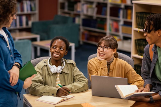 colleagues-studying-university-library.jpg