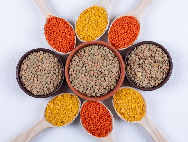 top-view-different-lentils-brown-bowls-wooden-spoons_176474-2188.jpg