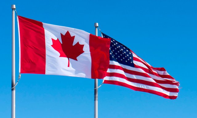 o-CANADA-UNITED-STATES-FLAGS-facebook-1140x684.jpg
