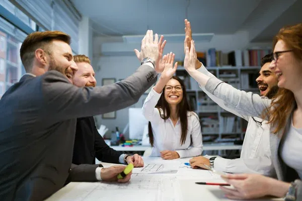 depositphotos_213675696-stock-photo-happy-business-colleagues-celebrating-successful.jpg