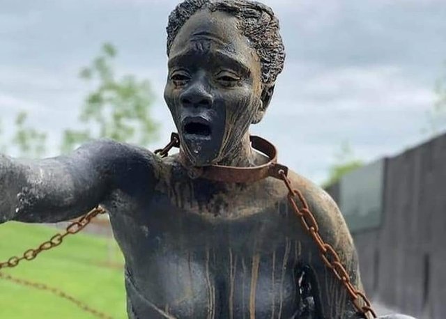 horrors and pains of slavery sculptures (3).jpg