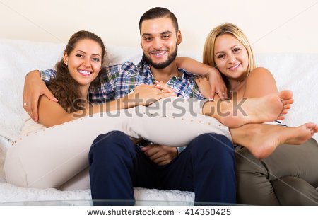 stock-photo-portrait-of-modern-polygamous-family-with-one-husband-and-two-wives-414350425.jpg