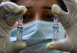 gurugram-a-health-worker-shows-vials-of-the-sputnik-v-coronavirus-vaccine-in-g-.jpg