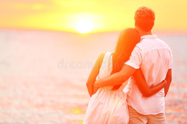 honeymoon-couple-romantic-love-beach-sunset-newlywed-happy-young-embracing-enjoying-ocean-travel-34259129.jpg