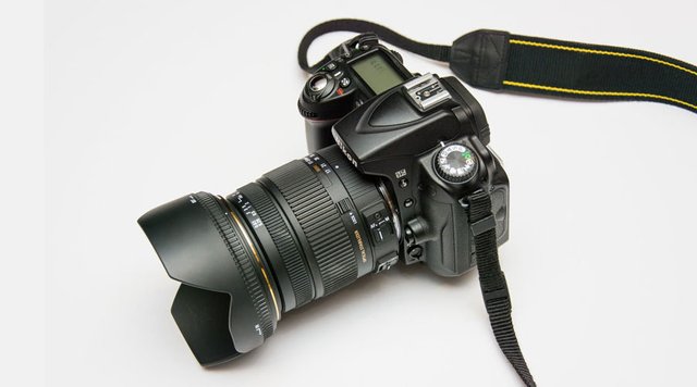 Nikon-D3400-dslr-camera with lens.jpg