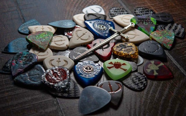 iron age guitar accessories, plectrums, knobs, kill switches.jpg