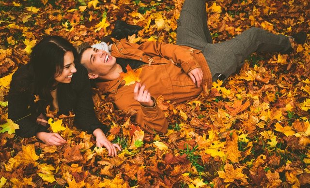 250dbb32-1ce0-4793-bb00-b5bf610631f0-couple-autumn-fall-leaves-orange-yellow.jpg