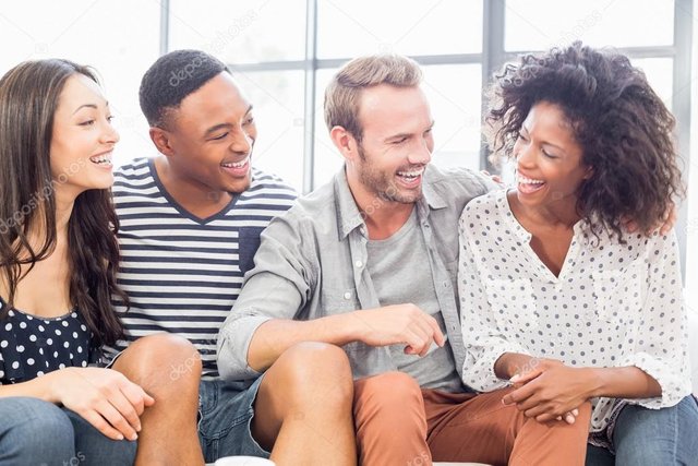 depositphotos_106149822-stock-photo-friends-sitting-on-sofa-and.jpg