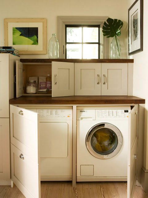 Hide washer dryer cabinetry cabinets laundry room.jpg