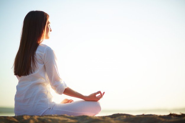 woman-sitting-yoga-pose-beach_1098-1454.jpg